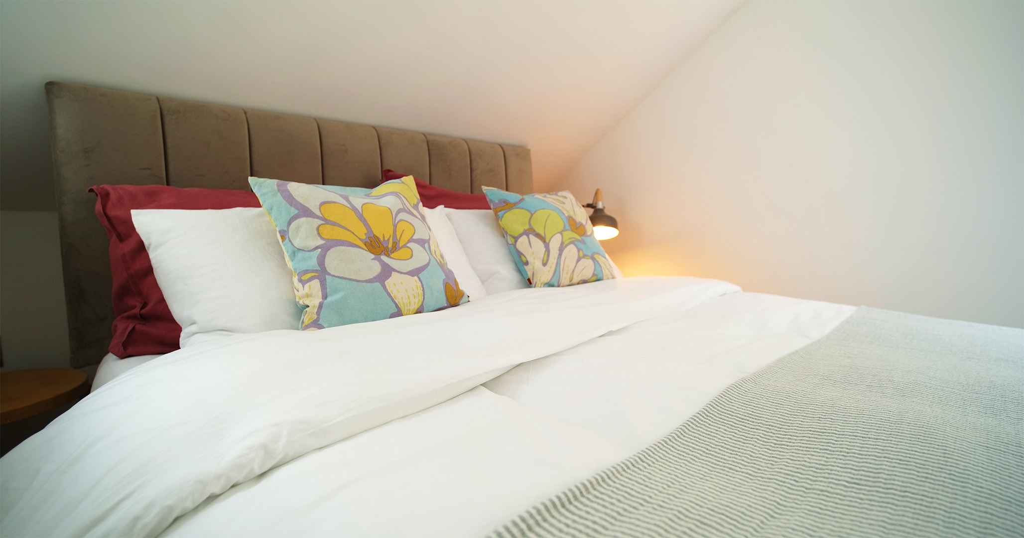 Close up of the king size bed on the first floor of Fernleigh Courtyard holiday cottage in the Wye Valley & Forest of Dean.